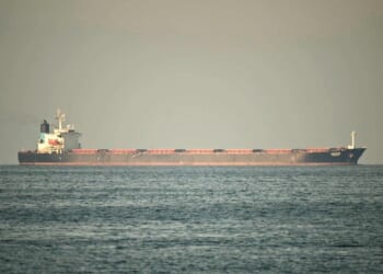 A cargo ship is pictured off the coastal city of Fujairah, in the Strait of Hormuz in the northern Emirate on Feb. 25, 2026.