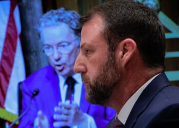 GOP Sen. Markwayne Mullin of Oklahoma is questioned by Senate Homeland Security and Governmental Affairs Committee Chairman Rand Paul of Kentucky Wednesday during Mullin's confirmation hearing to be the next Secretary of the Department of Homeland Security.