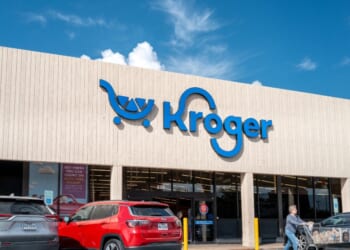 A person exits a Kroger grocery store in the Heights district on Oct. 8, 2025, in Houston, Texas.