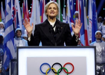 International Olympic Committee President Kirsty Coventry is seen speaking Feb. 6 during the Olympic opening ceremony at the 2026 Winter Olympics in Milan, Italy. Coventry announced Thursday that men will be barred from competing as women in Olympic events.