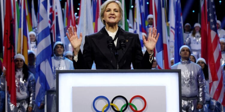 International Olympic Committee President Kirsty Coventry is seen speaking Feb. 6 during the Olympic opening ceremony at the 2026 Winter Olympics in Milan, Italy. Coventry announced Thursday that men will be barred from competing as women in Olympic events.