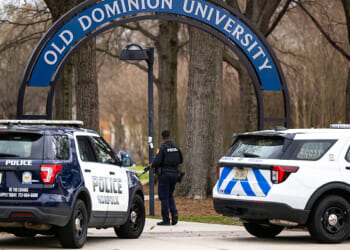 Police gather outside the Old Dominion University campus on March 12, 2026. (Kendall Warner - The Virginia Pilot / Getty Images)