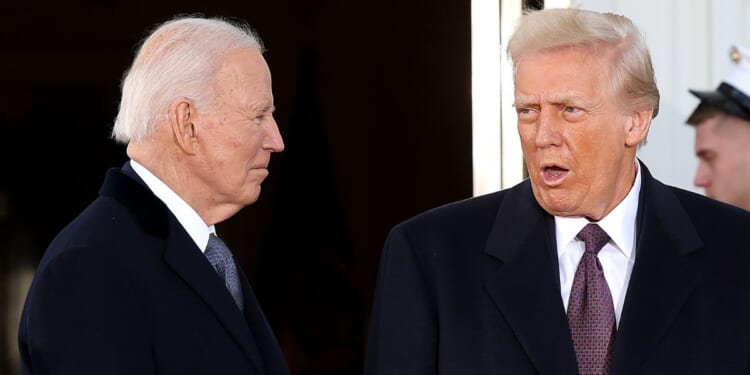 Former President Joe Biden, left, is pictured with President Donald Trump during inauguration ceremonies on Jan. 20, 2025, in Washington, D.C. Trump's administration has rejected Biden's claim of executive privilege over documents concerning autopen use and Biden family financial dealings.