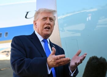 President Donald Trump speaks to reporters before boarding Air Force One at Palm Beach International Airport on March 23, 2026 in West Palm Beach, Florida.