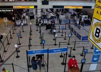 Travelers pass quickly though security lines Monday at BWI Airport in Baltimore, Maryland. Airports around the country started recovering from long lines as TSA agents begin to receive their first paychecks after President Donald Trump issued an order for them to be paid. About 61,000 TSA employees had been working without pay since a partial government shutdown started February 14.
