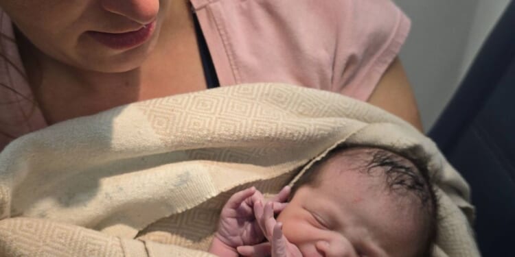 Paramedics help passenger give birth just before Delta flight lands