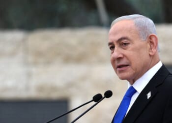 Israeli Prime Minister Benjamin Netanyahu speaks during a ceremony commemorating Israel's Remembrance Day for fallen soldiers, or Yom HaZikaron, at the Military Cemetery on Mount Herzl in Jerusalem on April 21, 2026.