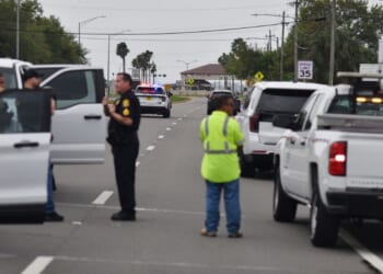 Law enforcement officers block traffic outside MacDill Air Force Base, the home of CENTCOM headquarters, in Tampa, Florida, on March 16, 2026.