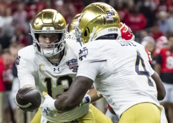 Two football players during a game