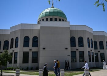 A mosque stands as people arrive to attend prayers in Plano, Texas, on April 11, 2025.