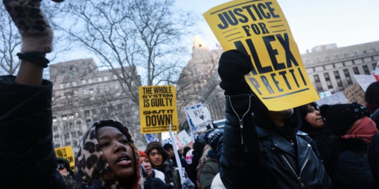 Hundreds of people, including students, attend a rally in lower Manhattan as part of a 'National Shutdown" event against ICE on Jan. 30 in New York City. Across the country, thousands participated in similar events in reaction to events in Minneapolis, where two people were killed in confrontations with ICE and other government immigration agents.