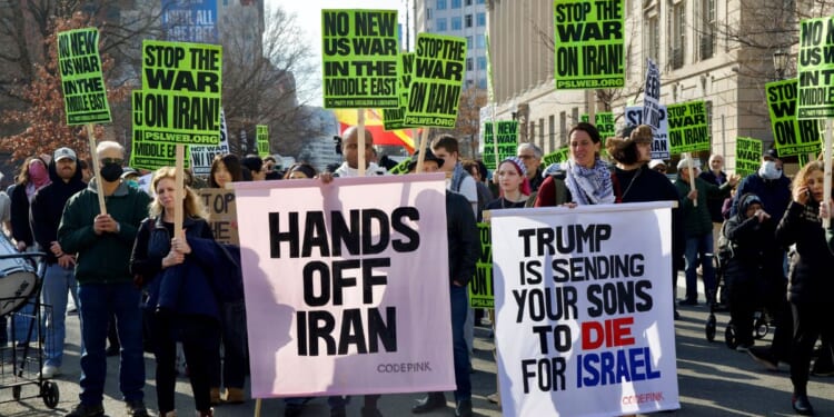 Demonstrators gather in front of the White House March 7 to protest against the war with Iran. Many of the anti-war voices started jeering at President Donald Trump Tuesday when his administration agreed to a two-week ceasefire rather than additional airstrikes, as Trump had threatened.