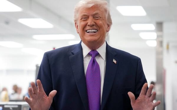 President Trump smiles and laughs facing the press in Reading, Ohio on March 11, 2026.