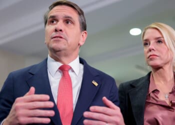 Deputy Attorney General Todd Blanche speaks beside Attorney General Pam Bondi on March 18, 2026.