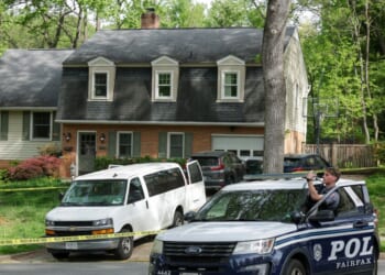 Law enforcement secure a crime scene outside the home of former Virginia Lt. Gov. Justin Fairfax on April 16, 2026, in Annandale, Virginia.