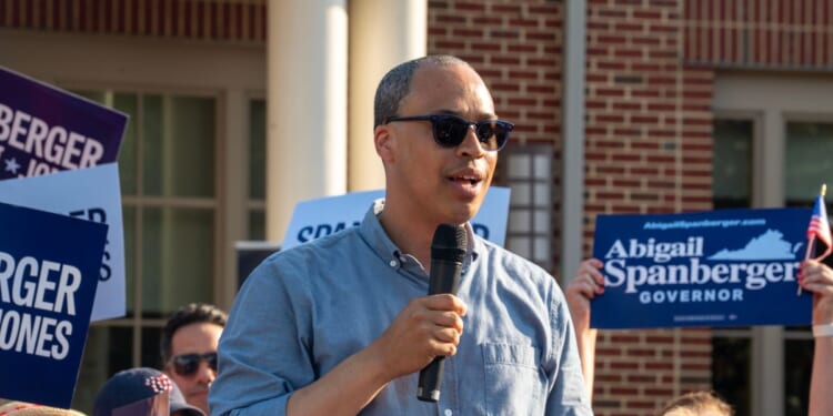 Jay Jones, who is running to become Virginia's attorney general in 2025, speaks to the audience during Abigail Spanberger's bus tour stop at Stacy C. Sherwood Community Center in Fairfax, Virginia, on June 26, 2025.