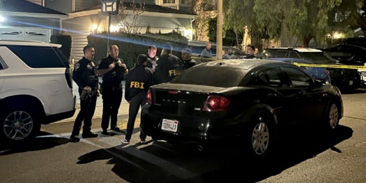 Torrance, California, gather Saturday night near a home linked to Cole Tomas Allen.