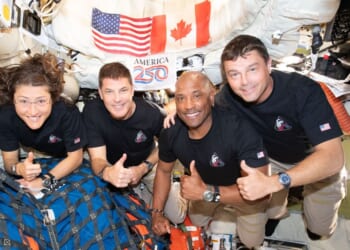 The Artemis II crew – from left, Mission Specialist Christina Koch, Mission Specialist Jeremy Hansen, Pilot Victor Glover, and Commander Reid Wiseman – pause for a group photo inside the Orion spacecraft on their way home. They are headed back to Earth for a splashdown in the Pacific Ocean Friday.