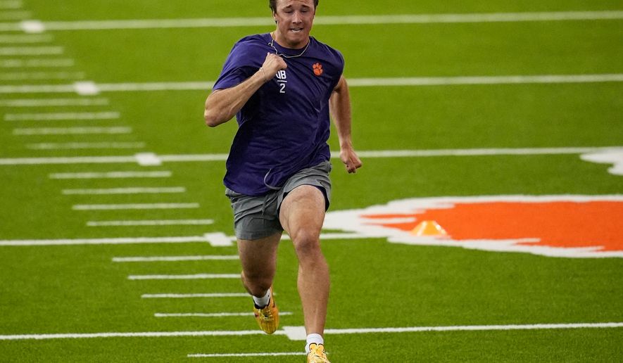 Clemson quarterback Cade Klubnik runs the 40-yard dash during the school's NFL football pro day, Thursday, March 12, 2026, in Clemson, S.C.. (AP Photo/Mike Stewart, File)