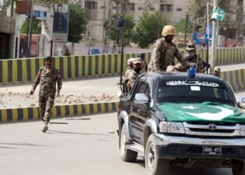 Pakistan authorities cordon off an area after a bomb blast went off in Quetta, Pakistan on Aug. 11, 2016.