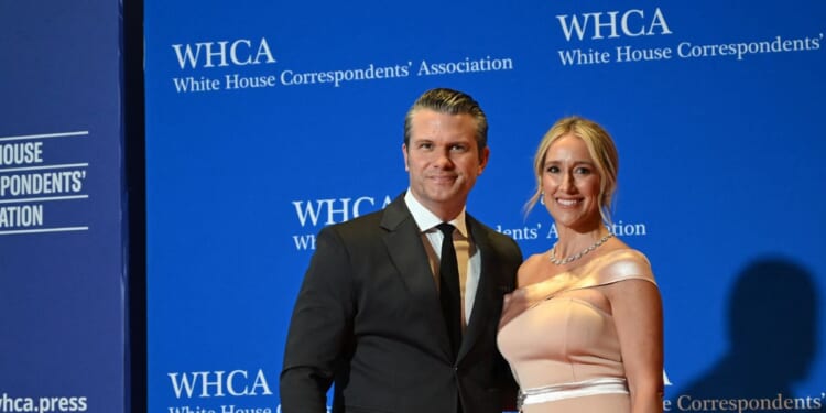 Secretary of War Pete Hegseth and wife Jennifer Rauchet attend the White House Correspondents' Dinner at the Washington Hilton in Washington, D.C., on April 25, 2026.