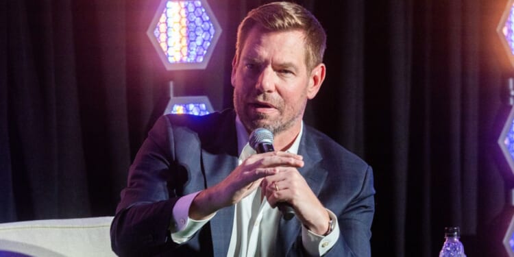 Then-Rep. Eric Swalwell of California, who resigned in disgrace Tuesday amid sexual assault allegations, is seen in a file photo from February, speaking at a California governor candidate forum in Los Angeles.