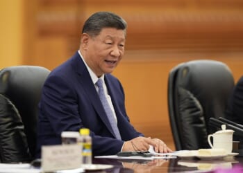 Chinese President Xi Jinping seated