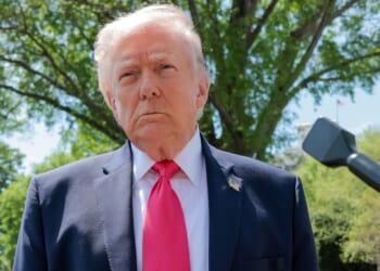 President Donald Trump speaks to the media Thursday before boarding Marine One on the South Lawn of the White House.