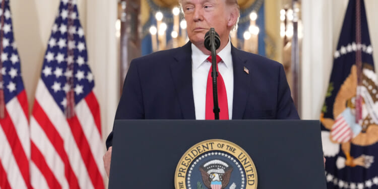 President Donald Trump pauses during a speech regarding the Iran war from the Cross Hall of the White House on April 1, 2026 in Washington, DC.