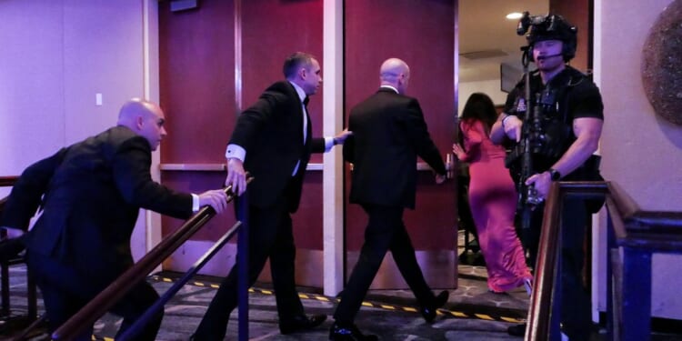 White House Deputy Chief of Staff for Policy Stephen Miller and his wife Katie Miller are escorted out of the annual White House Correspondents Association Dinner after a shooting occurred on April 25, 2026 in Washington, DC.