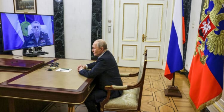 Putin hails Russia’s test launch of a new ballistic missile and calls it the world’s most powerful