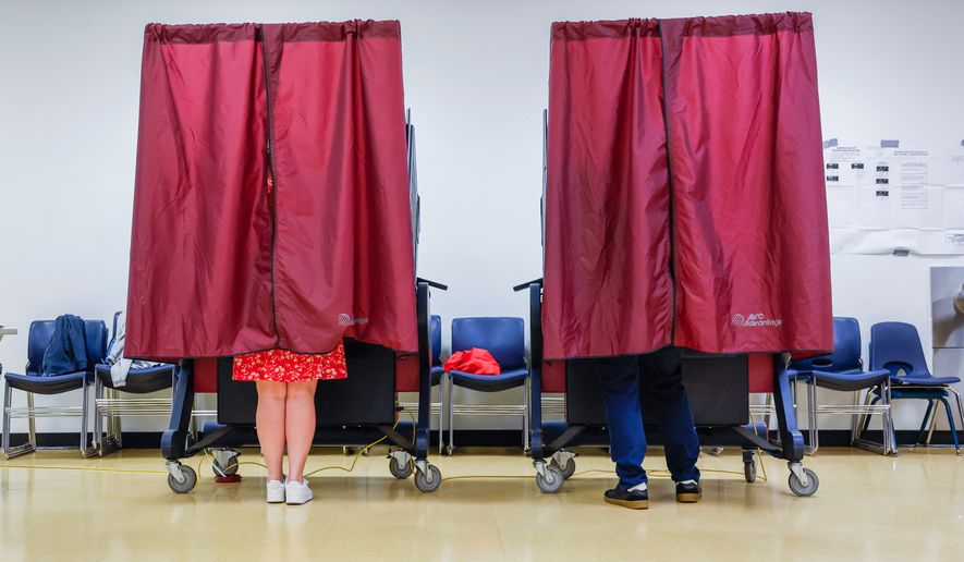Voters cast their ballots at the Dryades YMCA polling location in New Orleans, Saturday, May 16, 2026. (Sophia Germer/The Times-Picayune/The New Orleans Advocate via AP)