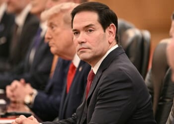 Secretary of State Marco Rubio looks on Thursday as President Donald Trump meets with China's President Xi Jinping at the Great Hall of the People in Beijing.