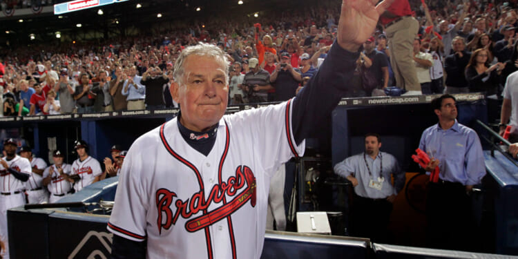 Atlanta Braves manager Bobby Cox waves to the crowd after a loss tot he San Francisco Giants in Game 4 of the National League Division Series in Atlanta on Oct. 11, 2010.