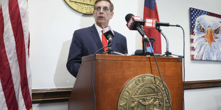 Georgia secretary of state and gubernatorial candidate Brad Raffensperger speaks to members of the media on prima election day on May 19 in Atlanta. (Megan Varner/Getty Images)