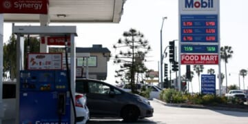 Vehicles park at a Mobil gas station in Redondo Beach, California on April 30, 2026.