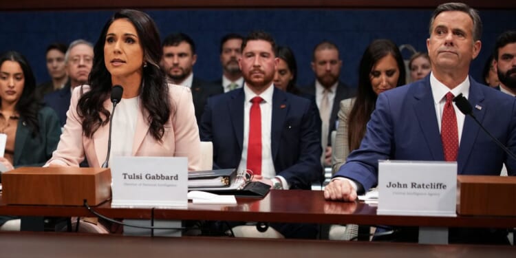 FBI Director Kash Patel, Director of National Intelligence Tulsi Gabbard, and Director of the Central Intelligence Agency John Ratcliffe testify during a House Select Intelligence Committee hearing on March 19, 2026, in Washington, D.C.