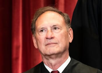 Supreme Court Justice Samuel Alito sits during a group photo of the Justices at the Supreme Court in Washington, D.C., on April 23, 2021.
