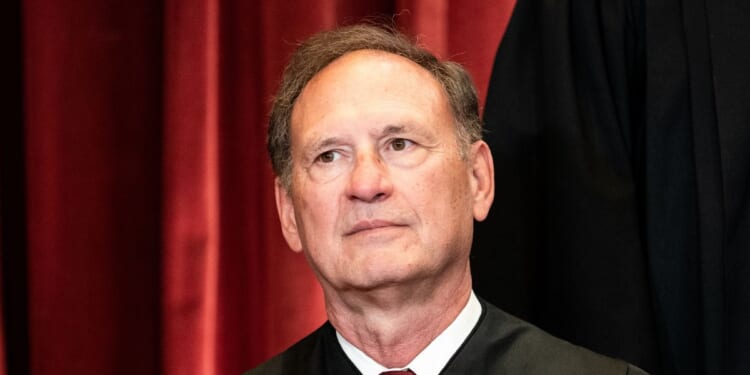 Supreme Court Justice Samuel Alito sits during a group photo of the Justices at the Supreme Court in Washington, D.C., on April 23, 2021.