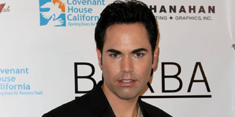 Scott Vincent Borba poses in a 2011 file photo at a launch party for his book "Skintervention" in Los Angeles.