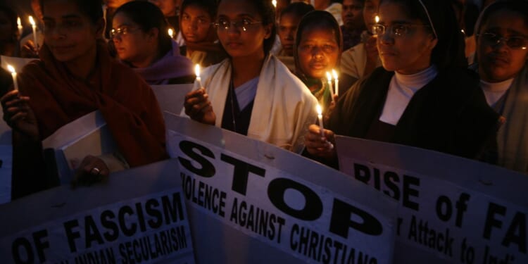 Indian Christians join in prayer to protest the killing of Indian Christians in New Delhi on Dec. 27, 2007.