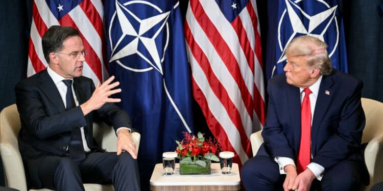 President Donald Trump speaks with NATO Secretary-General Mark Rutte during a bilateral meeting on the sidelines of the World Economic Forum annual meeting in Davos on Jan. 21, 2026.
