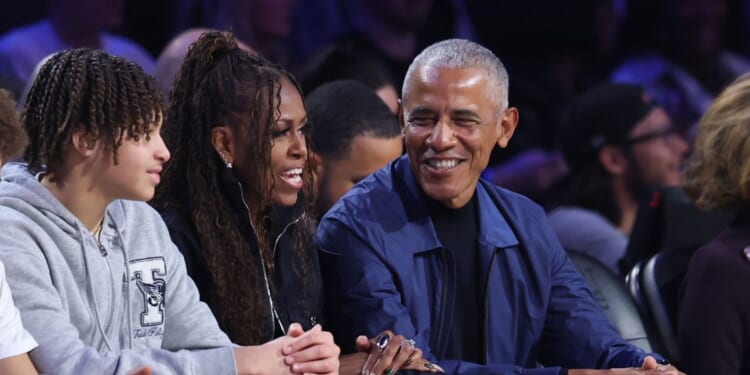 Michelle Obama and Barack Obama attend the 75th NBA All-Star Game at Intuit Dome on Feb. 15, 2026, in Inglewood, California.