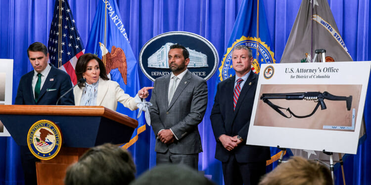 U.S. Attorney for the District of Columbia Jeanine Pirro points at a picture of a shotgun carried by Cole Tomas Allen, the suspect in the shooting incident in Washington at the annual White House Correspondents' Association dinner, as she and acting Attorney General Todd Blanche, U.S. Federal Bureau of Investigation (FBI) Director Kash Patel, Assistant Director in Charge (ADIC) of the FBI Washington Field Office Darren Cox take part in a press conference about the shooting incident, at the U.S. Department of Justice, in Washington, D.C., U.S., April 27, 2026. REUTERS/Kylie Cooper/File Photo