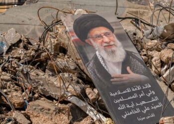 A portrait of Iran's former supreme leader, the now-deceased Ayatollah Ali Khamenei, sits on a pile of debris in the southern suburb of Dahieh, Lebanon on May 6, 2026.