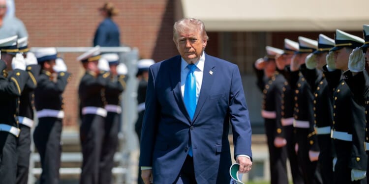 President Donald Trump arrives to the commencement ceremony on Cadet Memorial Field at the United States Coast Guard Academy on May 20, 2026, in New London, Connecticut.