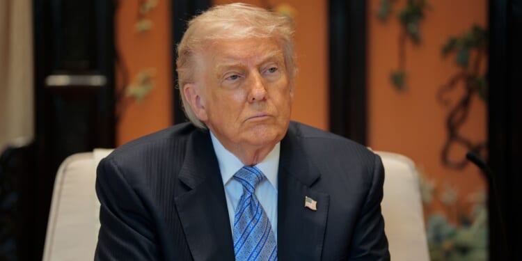 President Donald Trump looks on during a meeting with Chinese President Xi Jinping in Beijing, China on May 15, 2026.