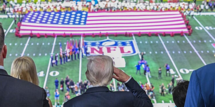 President Donald Trump salutes as the national anthem is played before the start of Super Bowl LIX between the Kansas City Chiefs and the Philadelphia Eagles at Caesars Superdome in New Orleans, Louisiana, on Feb. 9, 2025.