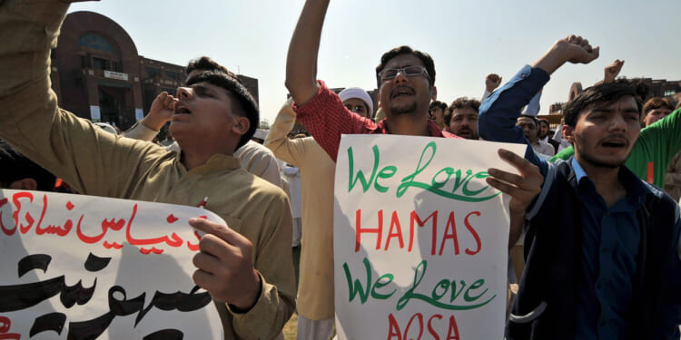 Students of International Islamic Univer Students of International Islamic University hold anti-Israeli placards and pro-Hamas placards as they chant slogans during a protest in Islamabad, Pakistan.