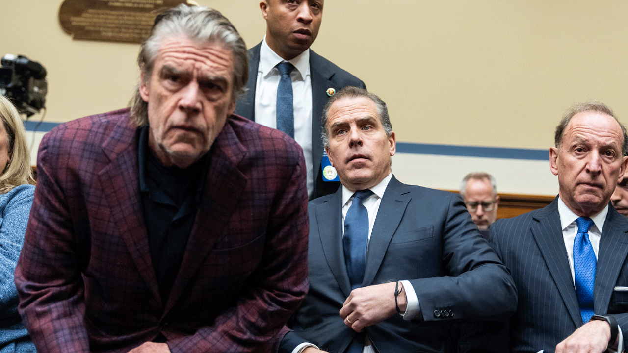 Hunter Biden, center, and his attorneys Abbe Lowell, right, and Kevin Morris, left, arrive for the House Oversight and Accountability Committee markup titled "Resolution Recommending That The House Of Representatives Find Robert Hunter Biden In Contempt Of Congress," in Rayburn Building on Wednesday, January 10, 2024. Biden sat in the audience for about 20 minutes. (Tom Williams/CQ-Roll Call, Inc via Getty Images)